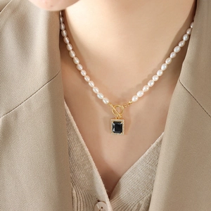 Fashionable titanium steel necklace with natural freshwater pearl and black zircon pendant