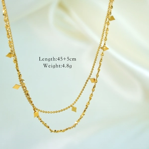Detail showing layered gold chain necklace length 45 plus 5cm and 4.8g weight specs