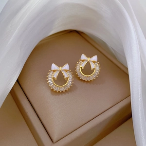 Elegant gold titanium wreath earrings with white bow and micro-pave crystals for women