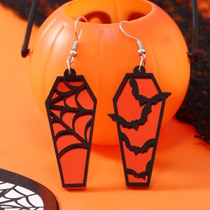 Gothic Halloween coffin earrings with spider web and bat patterns on orange background