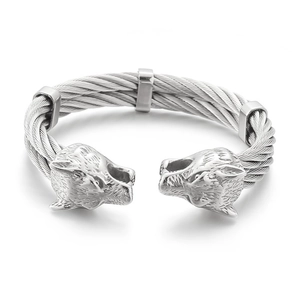 Punk style silver twisted cable bangle with detailed leopard head ends for men