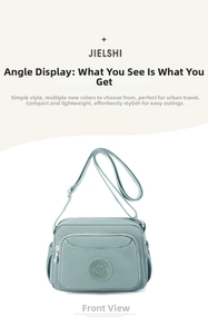 Close-up of mint green water-resistant nylon shoulder bag with zip pockets and logo