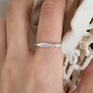 S925 sterling silver brushed fish ring worn on hand for a minimalist fashion style