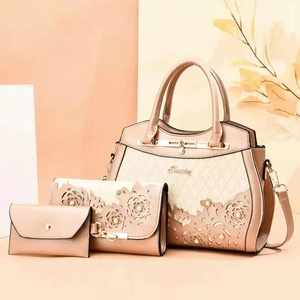 3-piece nude pink leather handbag set with hollow flower design and quilted texture