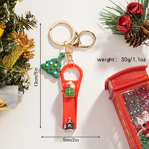 Christmas snowman keychain with nail clipper featuring a rabbit and green holiday tree