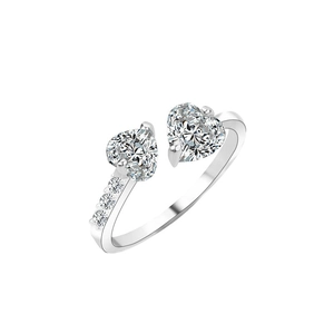 Elegant silver open ring featuring two heart-shaped clear stones and zircon accents