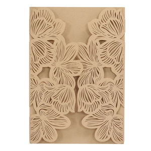 Detailed laser-cut floral pattern on champagne gold pearlescent paper wedding invitation