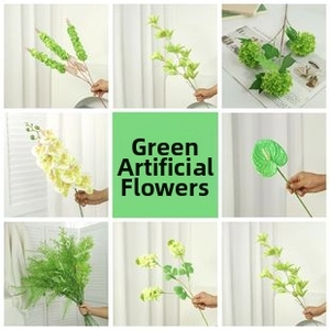 Detailed view of artificial green hydrangea and silk orchid stems for wedding decor