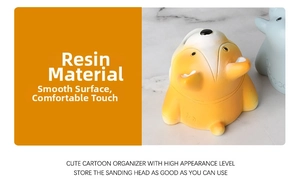 Detailed view of the smooth resin cartoon fox nail drill bit holder with orange finish