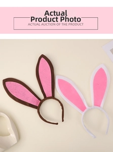 Flat lay detail of plush rabbit ear headbands in pink, white, and brown festive colors