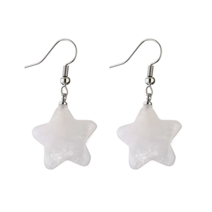 Macro shot of silver star drop earrings with translucent white resin stone texture