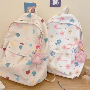 Cute Japanese style backpack with floral and heart prints plus pink flower pendant