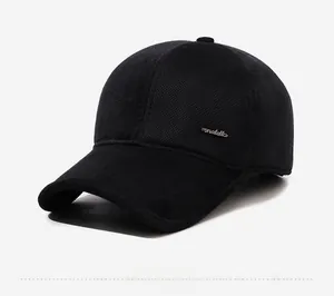 Detailed close-up of black waffle texture baseball cap with Donatello metal logo