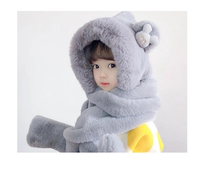 Close-up of grey plush child hood with animal ears and M embroidery detail