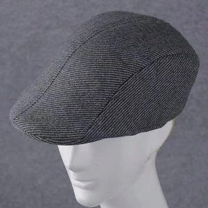 Detail view of dark grey striped ivy cap with premium woven texture on a mannequin