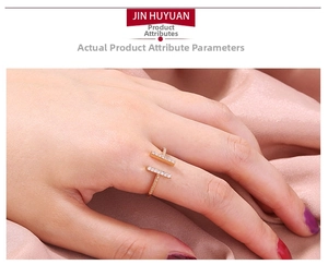 Macro detail of rose gold pavé zircon adjustable double-bar ring on silk fabric