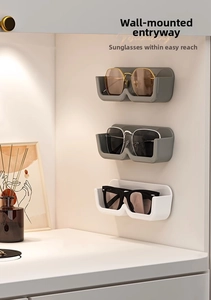 Wall-mounted glasses organizer with U-shaped design for sunglasses storage on walls