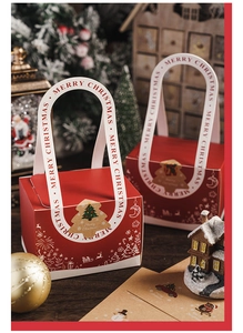 Macro detail of red Merry Christmas gift box with snowflake patterns and sealing sticker