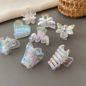 Iridescent mini hair claw clips set with butterfly and heart shapes for women
