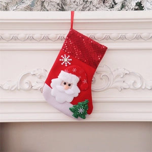 Red sequin Christmas stocking featuring 3D Santa Claus and green tree decorations