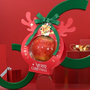 3D render of a festive red and green Christmas apple gift box with Merry Christmas text