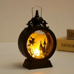 Detail of Halloween LED lantern featuring witch silhouette and warm spooky light effect