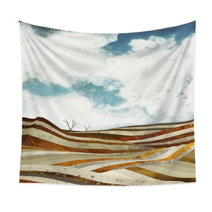 Detailed view of modern abstract landscape tapestry with blue sky and brown mountains