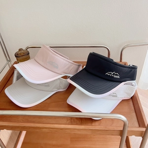 Group of four breathable quick-dry sun visors for running in pink, black, grey and white