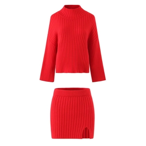 Red knit two-piece set featuring high-neck long-sleeve sweater and side slit skirt