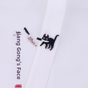 Set of two black cat and knife enamel pins featuring 'Killing it' text decoration
