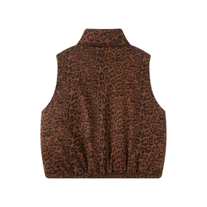 Macro detail of the leopard print pattern on a high collar reversible padded vest