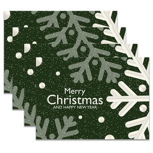 Juego de 4 manteles individuales navideños verde bosque con copos de nieve blancos
