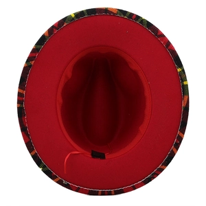 Close-up of red felt jazz hat with detailed plaid brim and interior sweatband detail