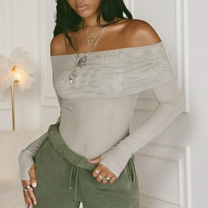 Sexy grey off-shoulder mesh top with long sleeves for women on a minimalist background