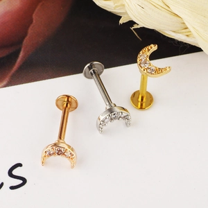 Three moon shaped zirconia lip studs in gold silver and rose gold for body piercing