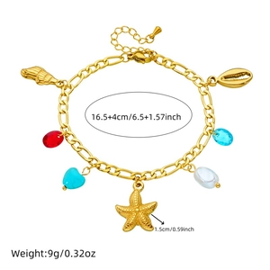 Gold stainless steel ocean bracelet with turtle, starfish, blue beads and pearls