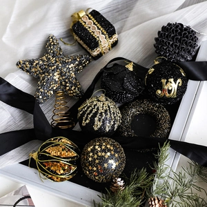 Elegant black and gold Christmas ornament set with glitter balls and tree topper star