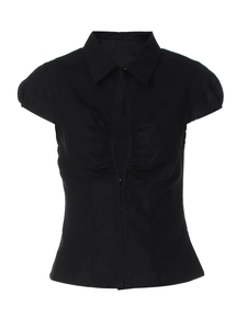Close-up of black short sleeve top featuring button collar and ruched chest detail