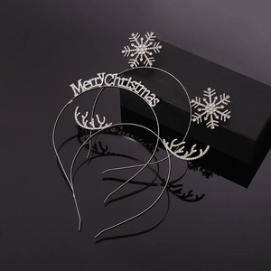Macro detail of silver reindeer horn headbands with sparkling rhinestones and metal finish