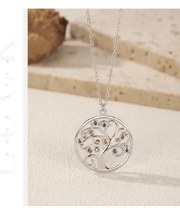 Macro view of S925 silver tree of life pendant featuring colorful gemstones detail