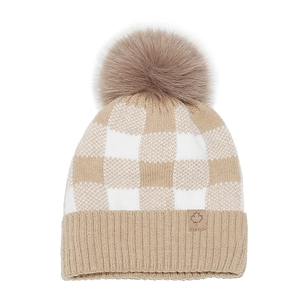 Close-up of winter knit beanie featuring checkerboard pattern and faux fur pom-pom
