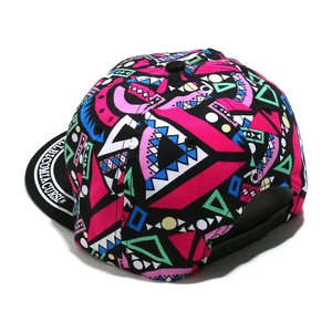 Detail of adjustable snapback buckle and vibrant geometric print on street style cap