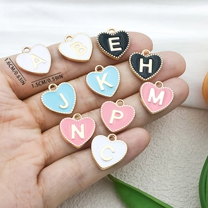 Golden heart letter charms with colorful enamel for DIY jewelry making and necklaces
