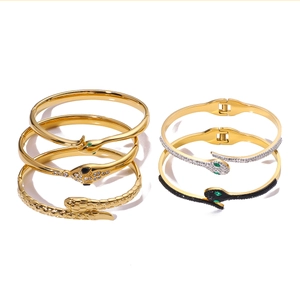 Classic snake-shaped stainless steel bracelets with rhinestones in gold and black finish
