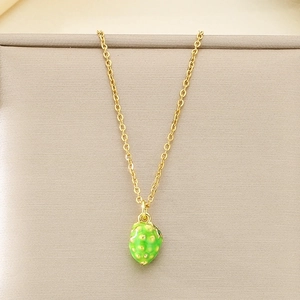 Pastoral style necklace featuring a delicate golden chain and green strawberry pendant