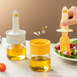 Duck-shaped glass oil bottle with heat-resistant silicone brush for kitchen and BBQ