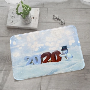 Absorbent flannel floor mat featuring a 2020 winter snowman scene on a light wood floor