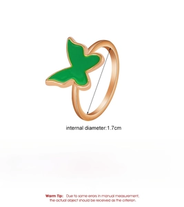 Detailed view of rose gold butterfly ring specifications including diameter and material