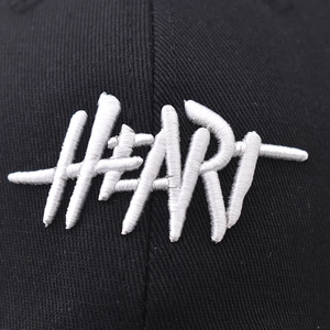 Cotton baseball cap featuring white 3D Heart graffiti embroidery on black fabric