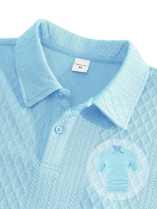 Detail of light blue polo shirt collar featuring textured waffle knit fabric and buttons